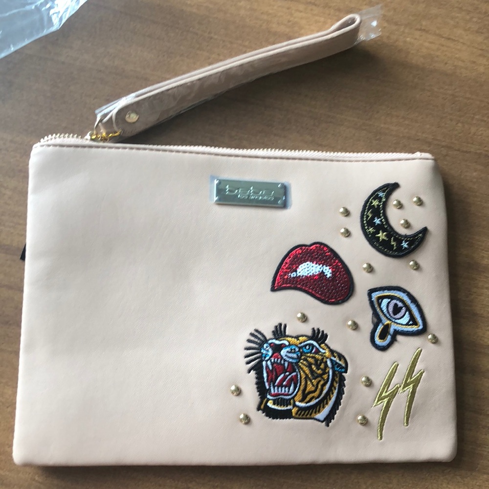 bebe nude clutch with embellishments